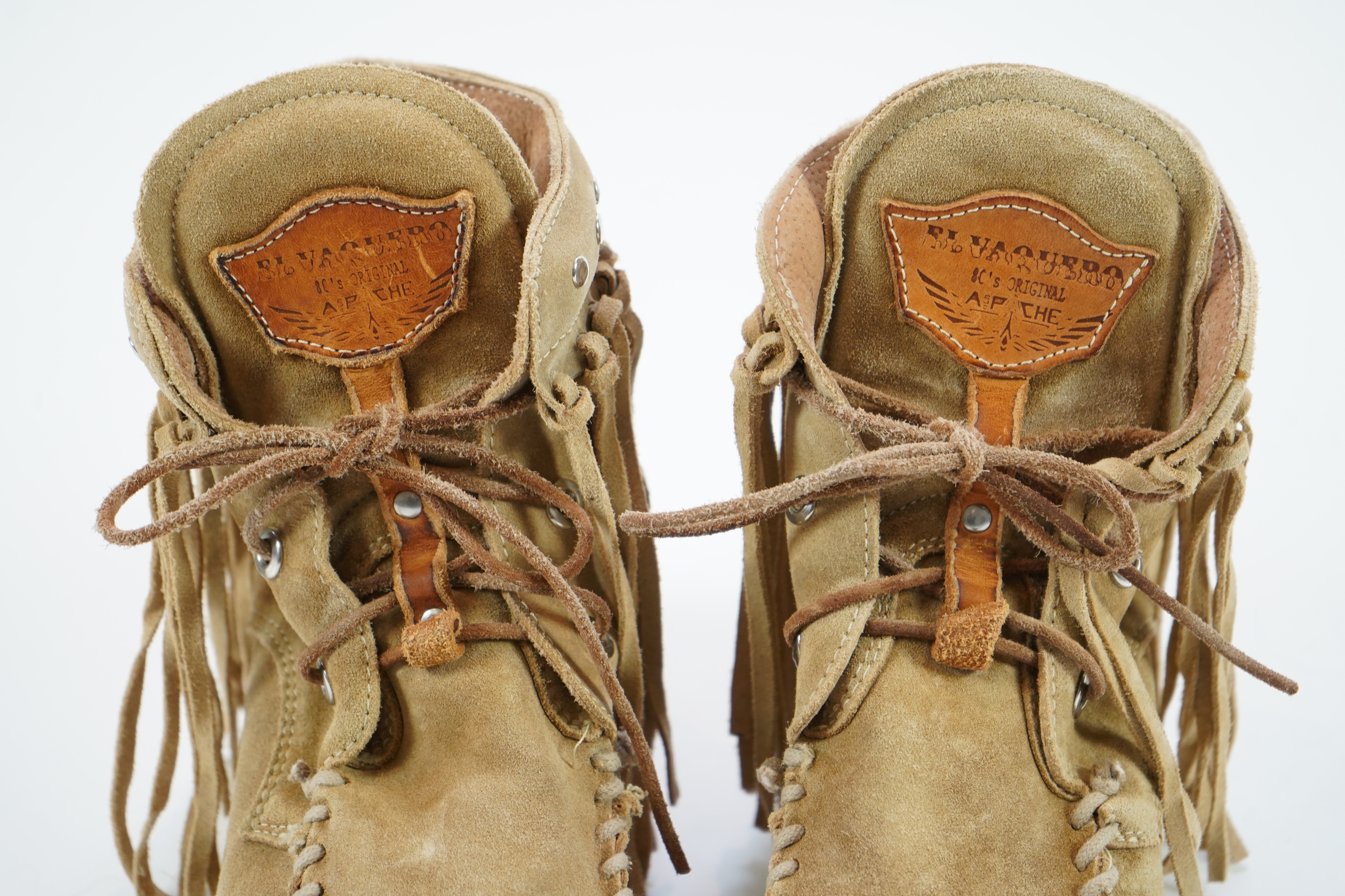 A pair of El Vaquero light tan suede wedge moccasin boots, size EU 41